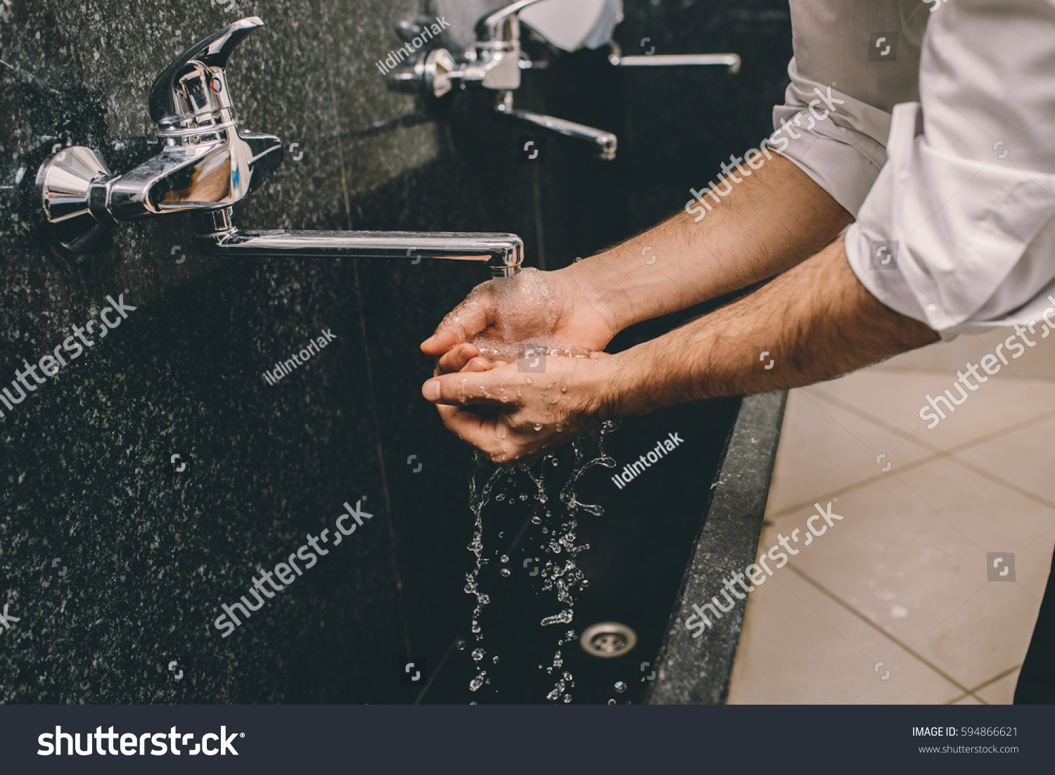 Muslim man washing his hands #594866621