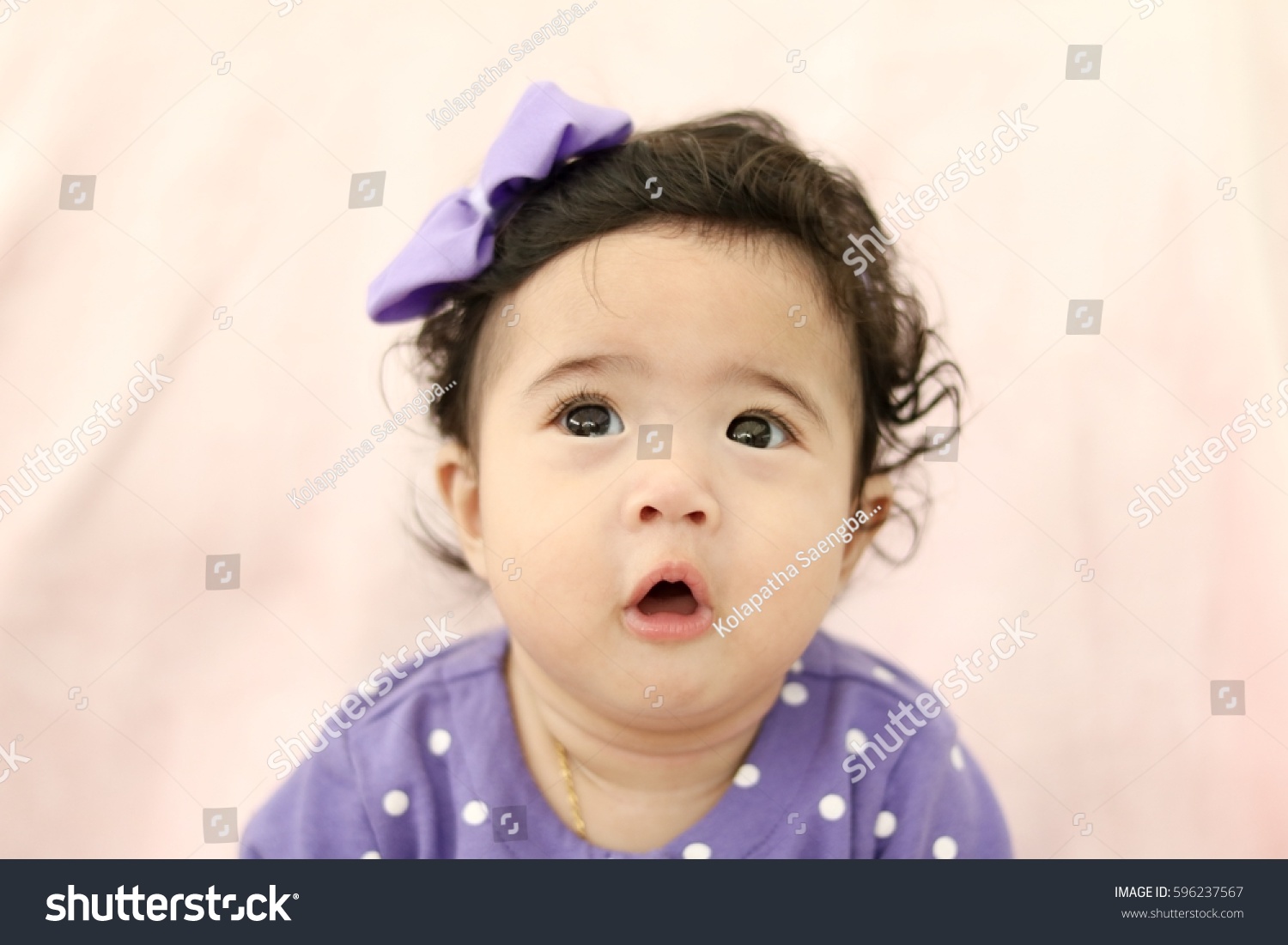 Royalty Free Asian Cute Baby Girl Has Big Eyes And 596237567 Stock