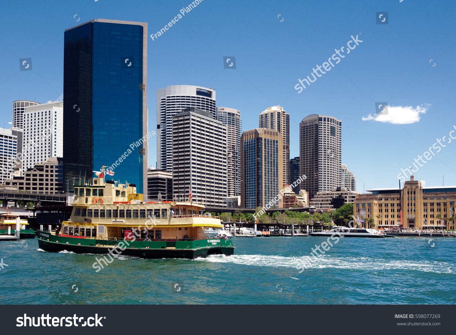 Circular Quay, harbour, commuter ferry wharves, with Sydney CBD Circular Quay, harbour, commuter ferry wharves, with Sydney CBD in the background #598077269