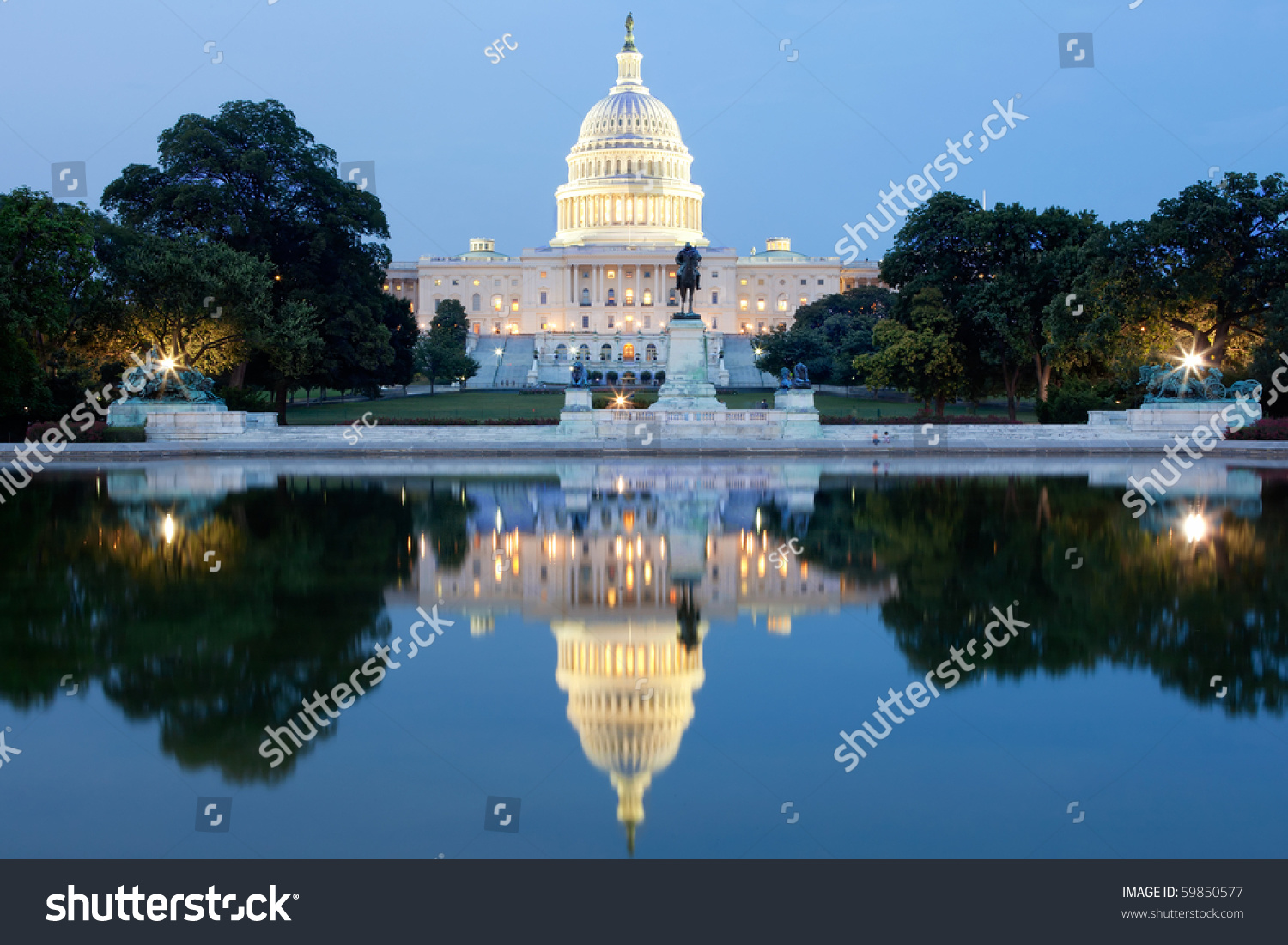 The United States Capitol building in Washington DC, USA - after dark with water reflection #59850577