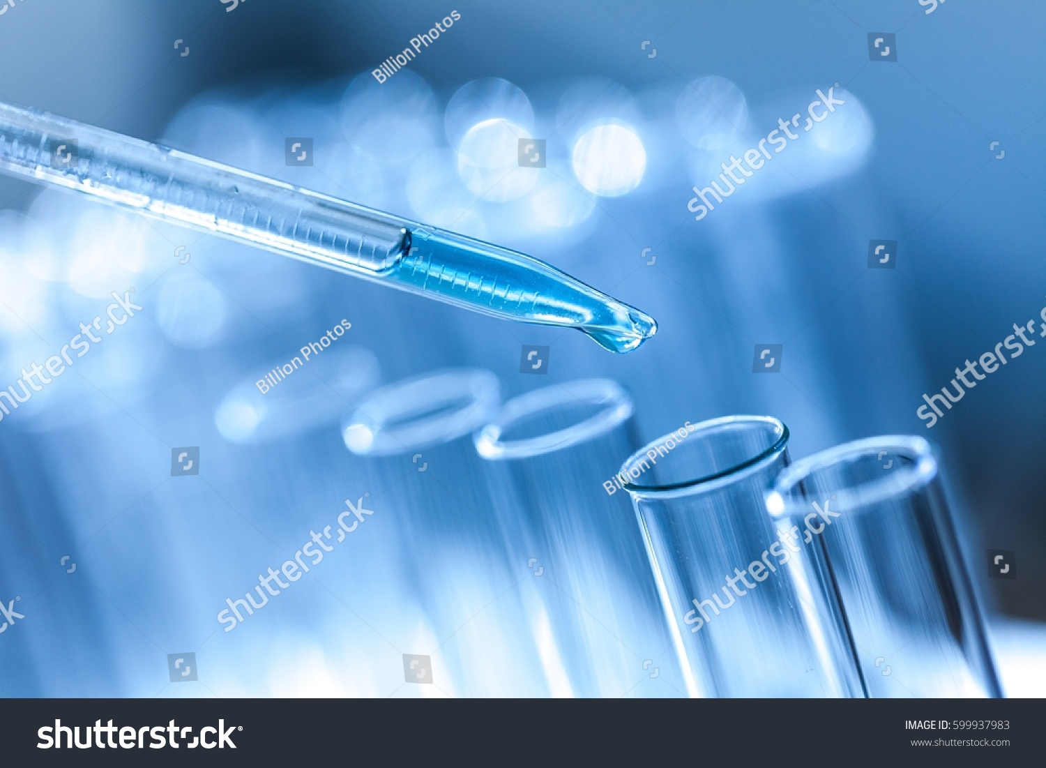 Pipette and test tubes. #599937983