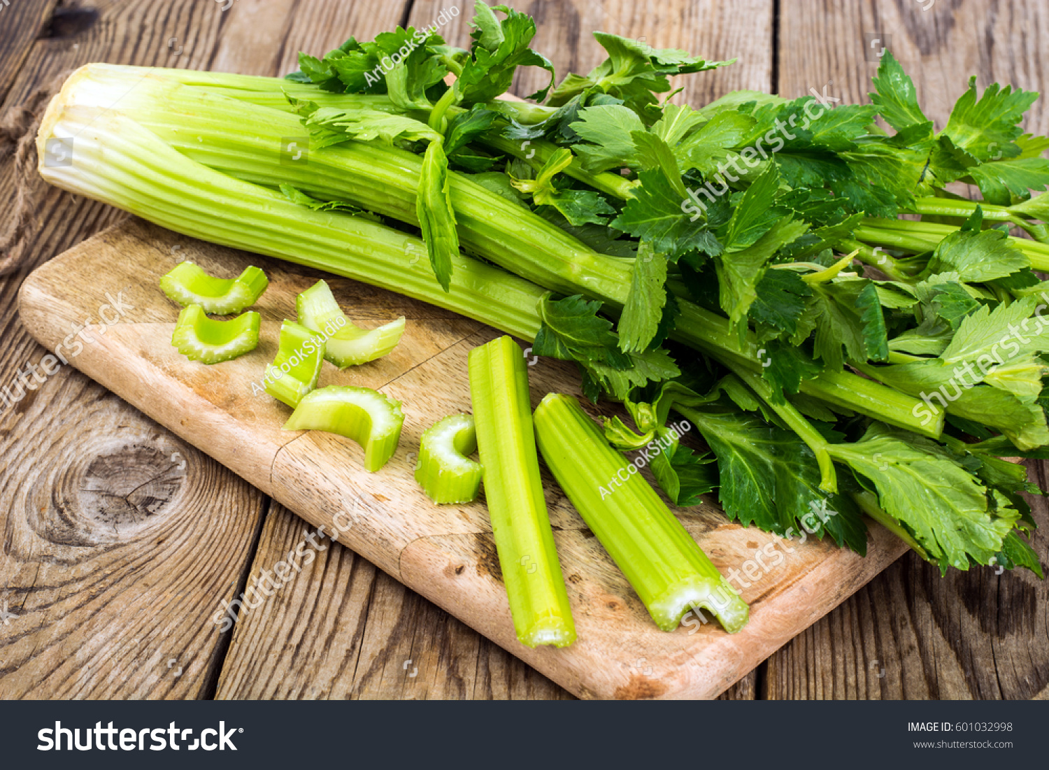 Bunch of fresh celery stalk with leaves. Studio Photo #601032998