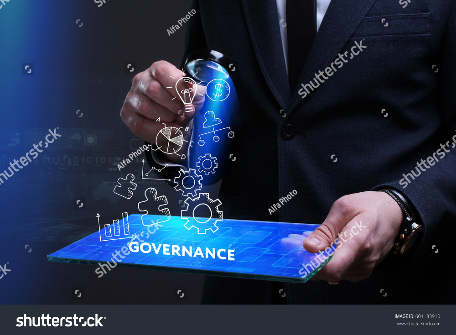 Business, Technology, Internet and network concept. Young businessman working on a virtual screen of the future and sees the inscription: Governance #601183910