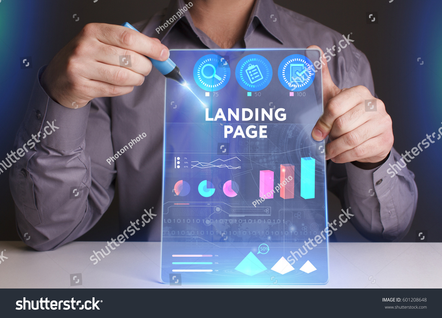 Business, Technology, Internet and network concept. Young businessman working on a virtual screen of the future and sees the inscription: Landing page
 #601208648