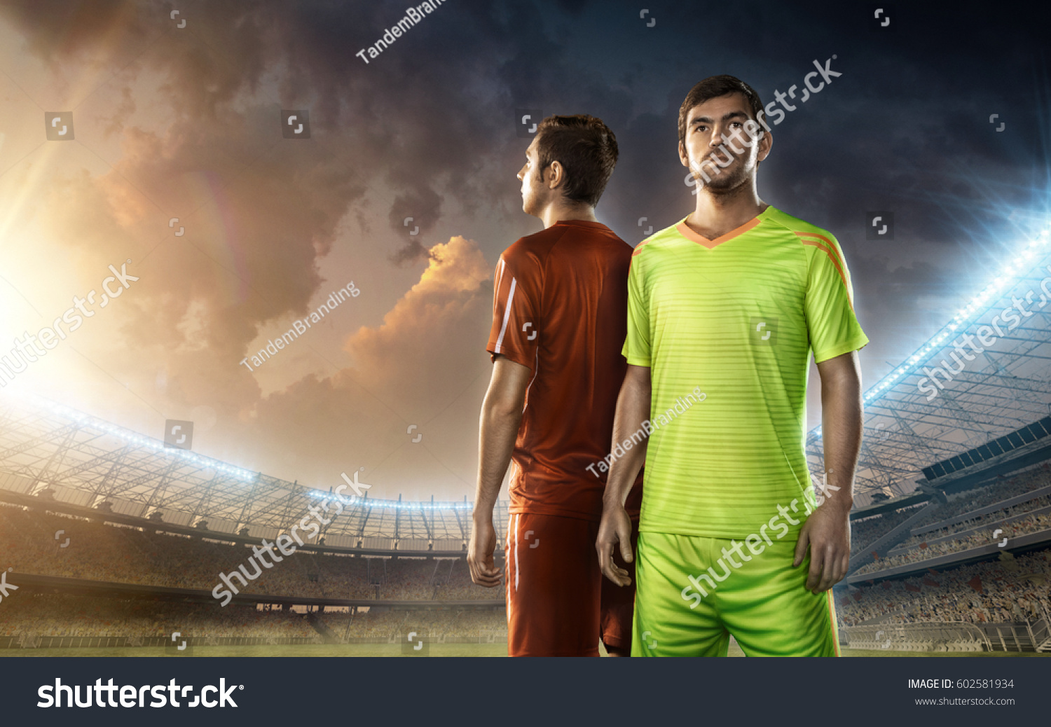 Two soccer players on a stadium #602581934