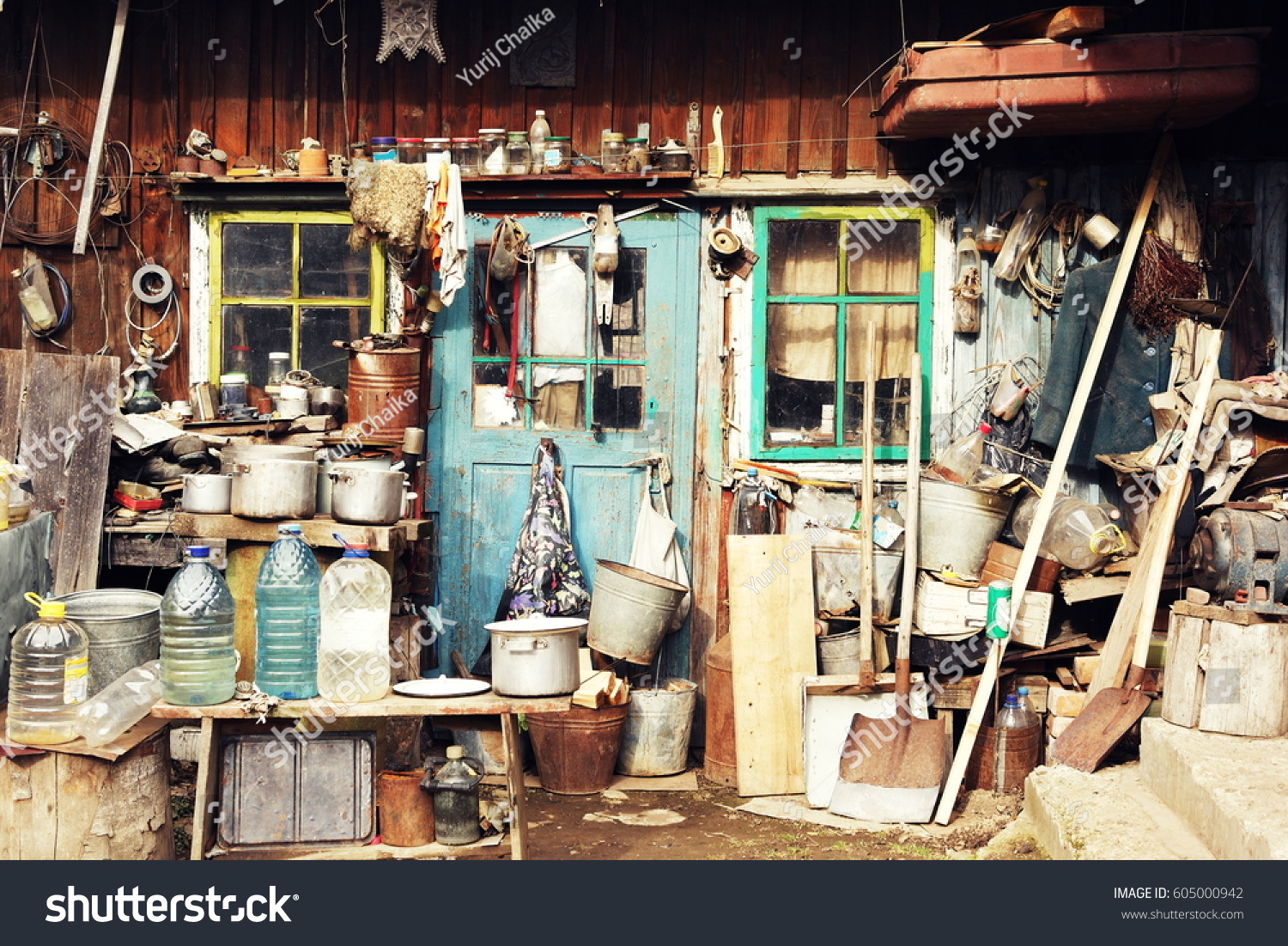 cluttered yard, Bukovina, Chernivtsi region, village Baniliv-Podgorny #605000942