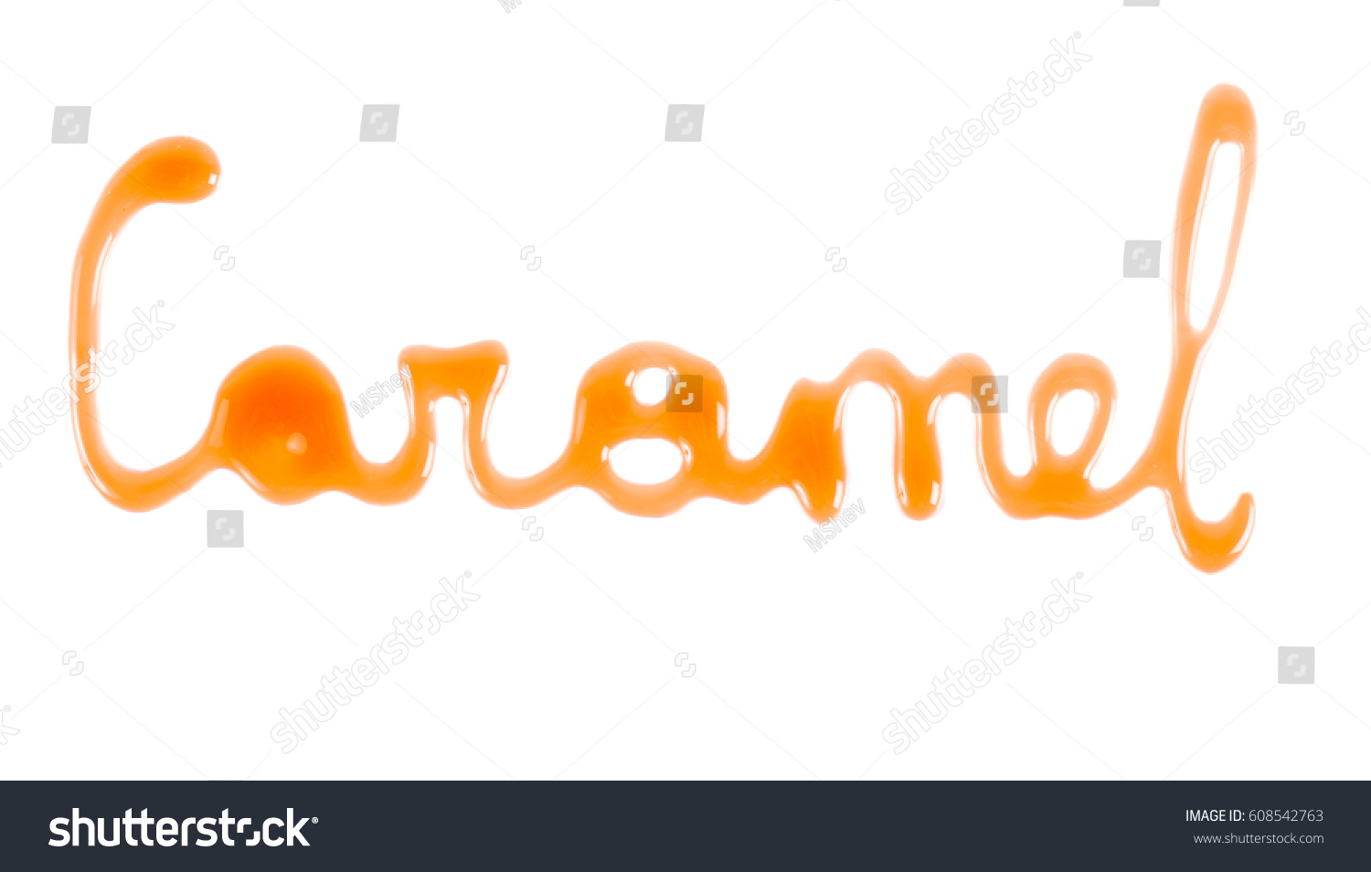 Word Caramel written with caramel sauce over white background #608542763