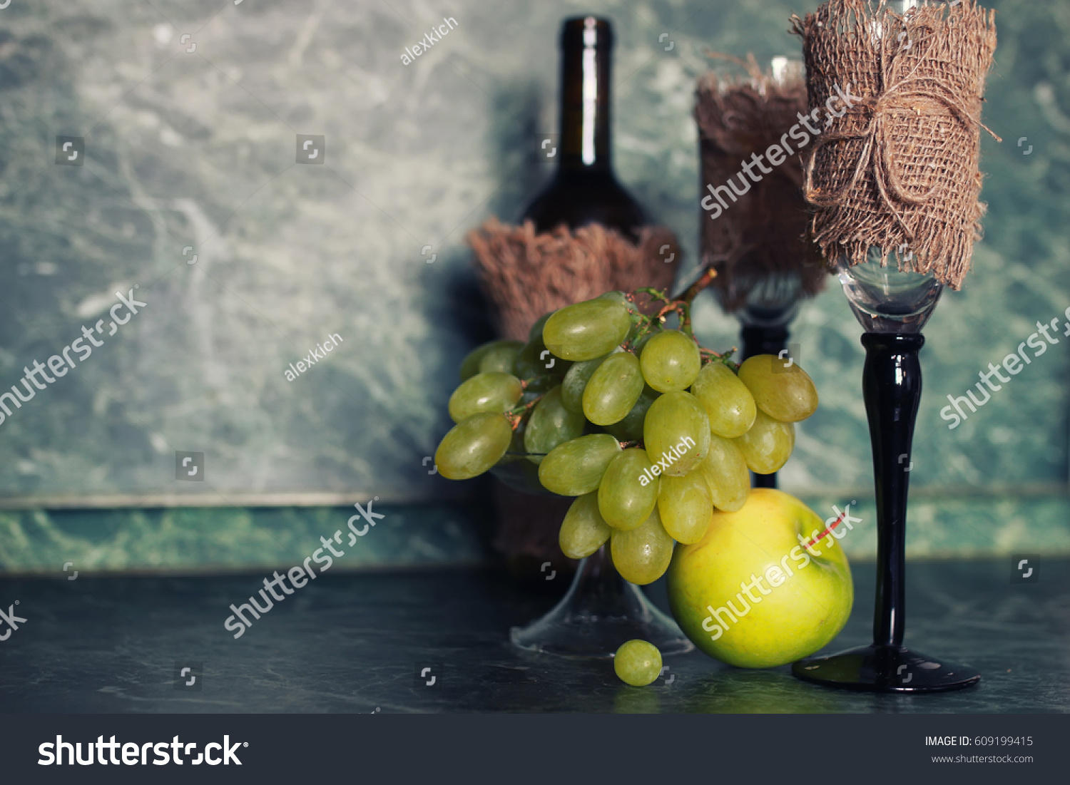 holiday set wine bottle with green grape on background #609199415
