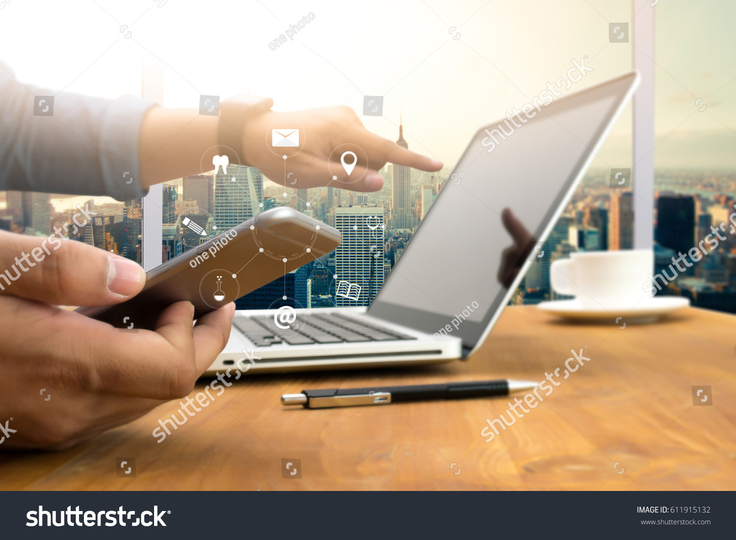 man hand holding smartphone device and  technology , businessman working with modern devices, digital tablet computer and mobile phone. #611915132