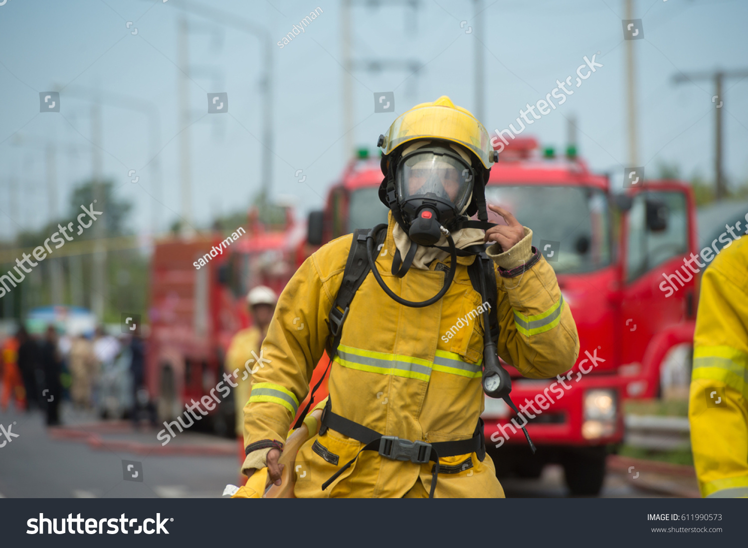 firefighters at work in oxygen suit #611990573