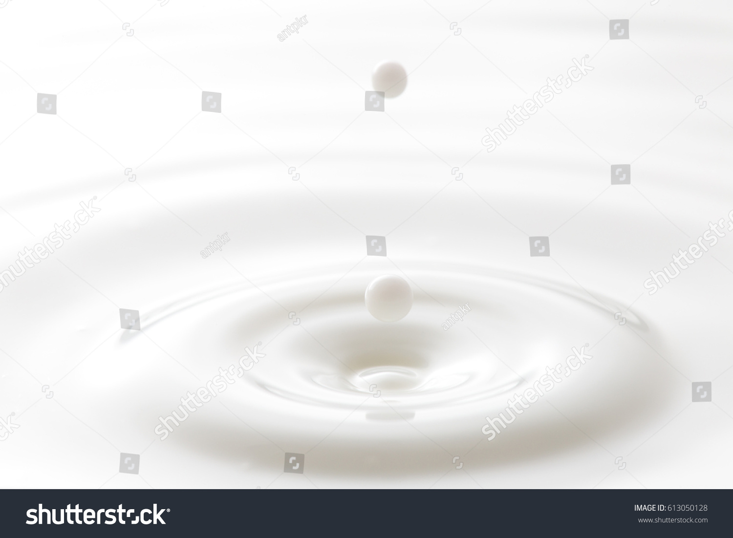 milk drop with ripples #613050128