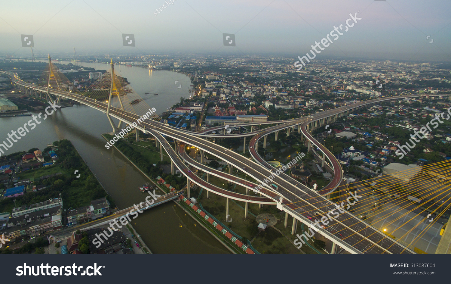 aerial view of bhumibol bridge crossing chaopraya river in bangkok thailand #613087604
