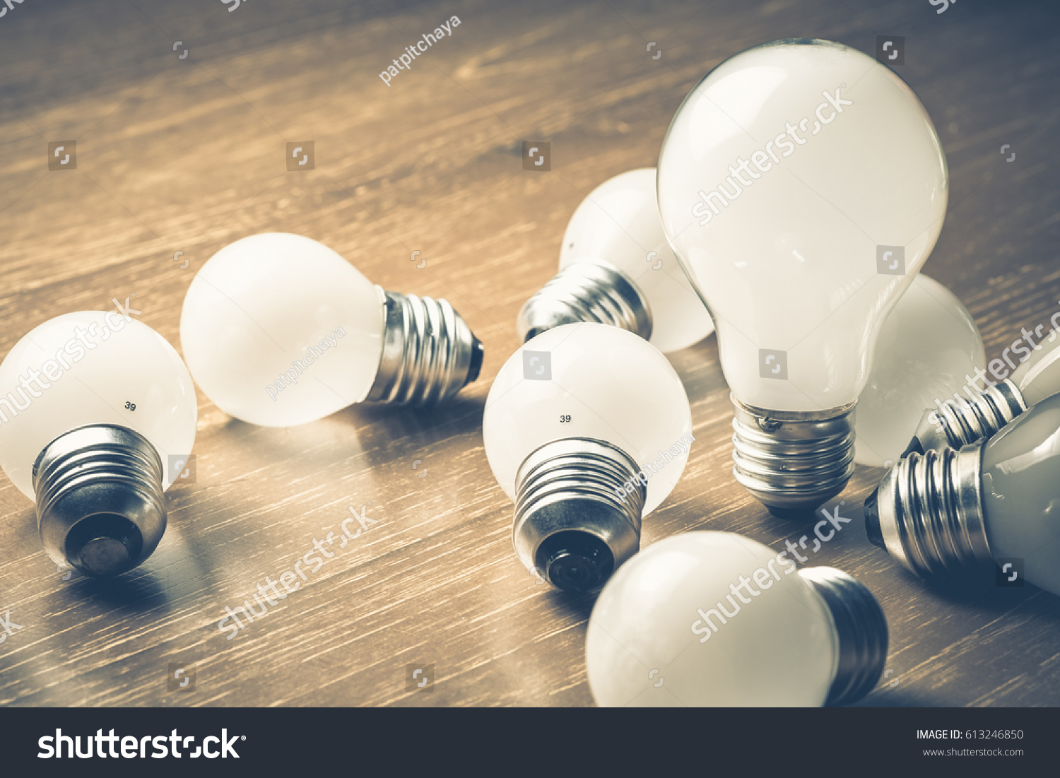 Bigger light bulb among the small ones #613246850
