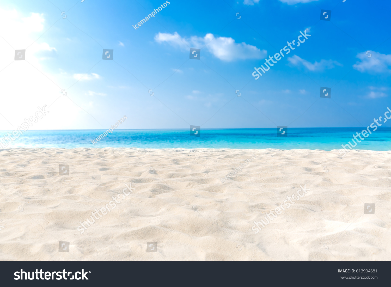 Empty tropical beach background. Horizon with sky and white sand #613904681