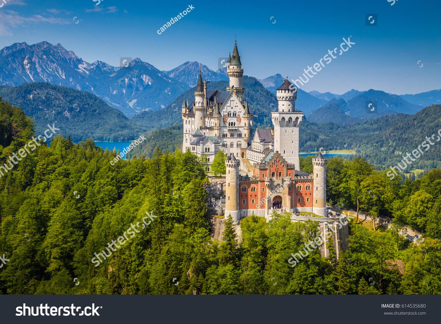 Beautiful view of world-famous Neuschwanstein Castle, the nineteenth-century Romanesque Revival palace built for King Ludwig II on a rugged cliff near Fussen, southwest Bavaria, Germany #614535680
