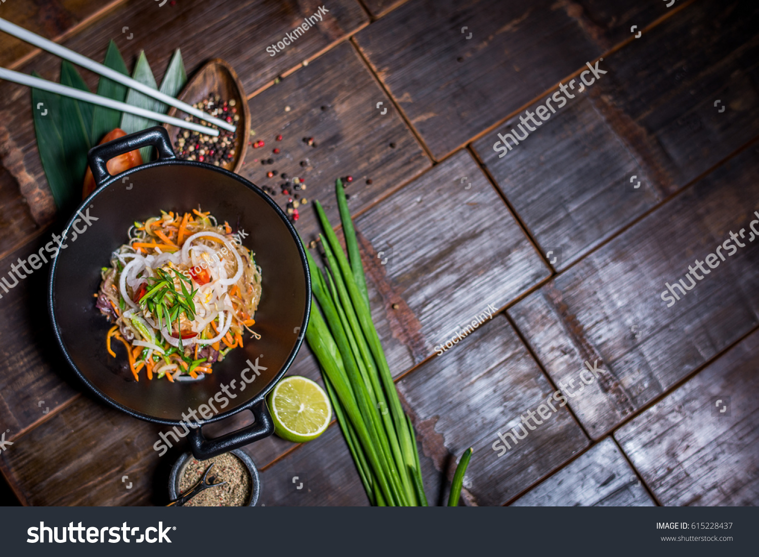 Noodles in bowl on wood table top
 #615228437