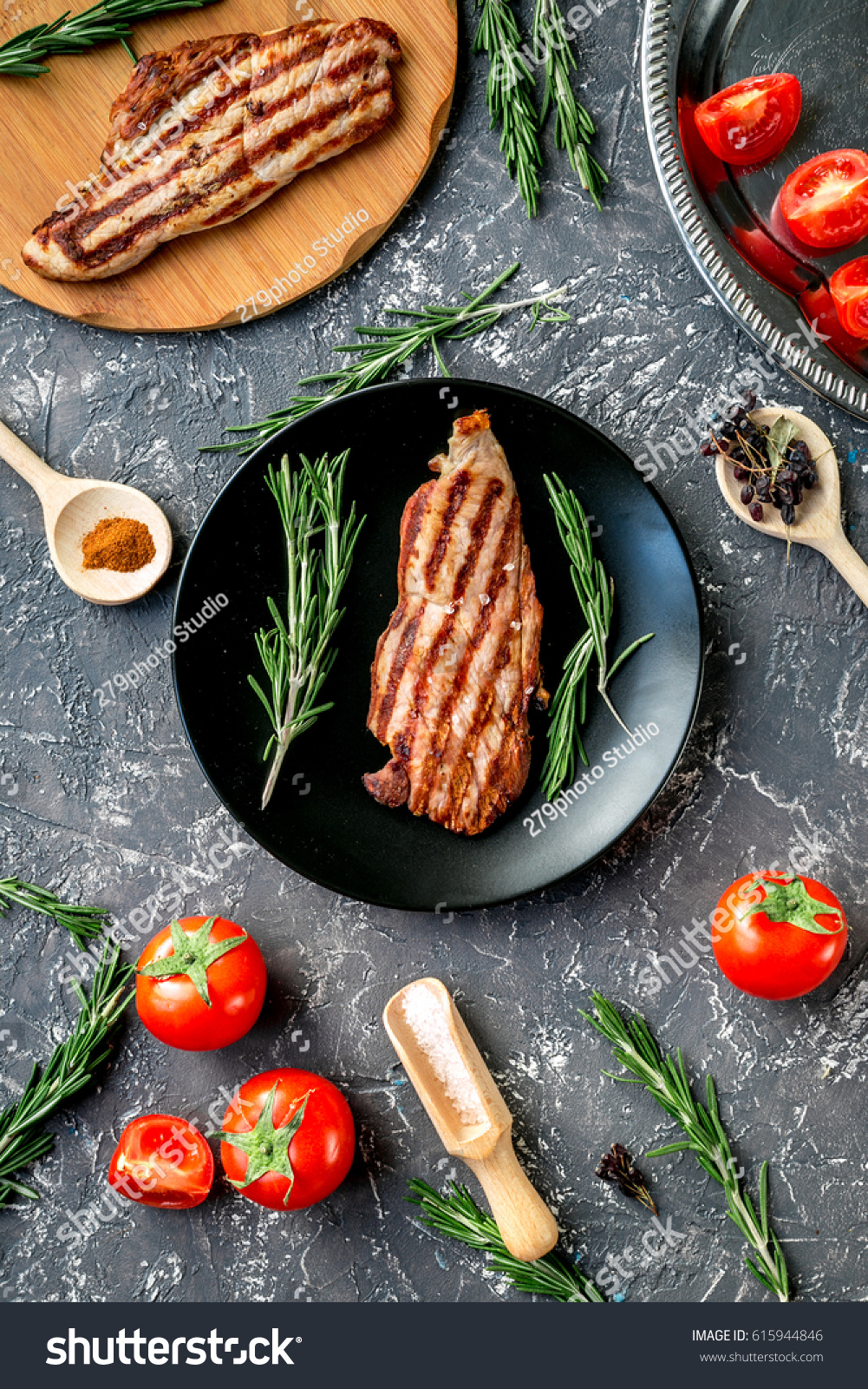 roasted meat in cooking steak concept gray background top view #615944846
