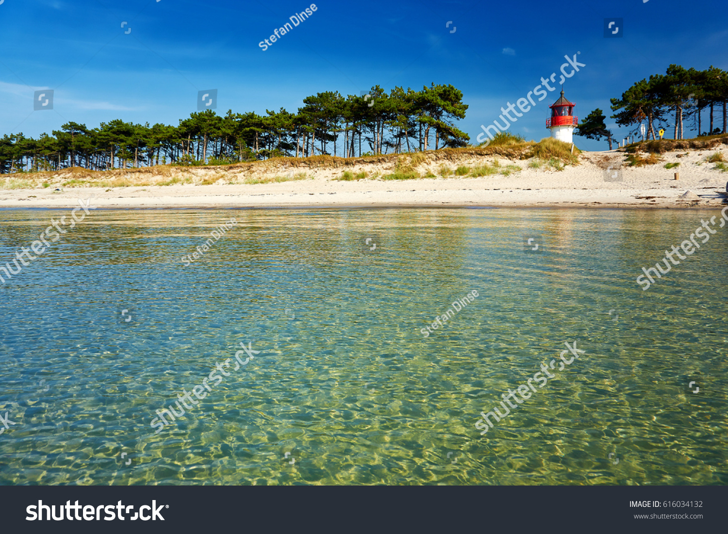 lighthouse Gellen on lonely summer beach #616034132