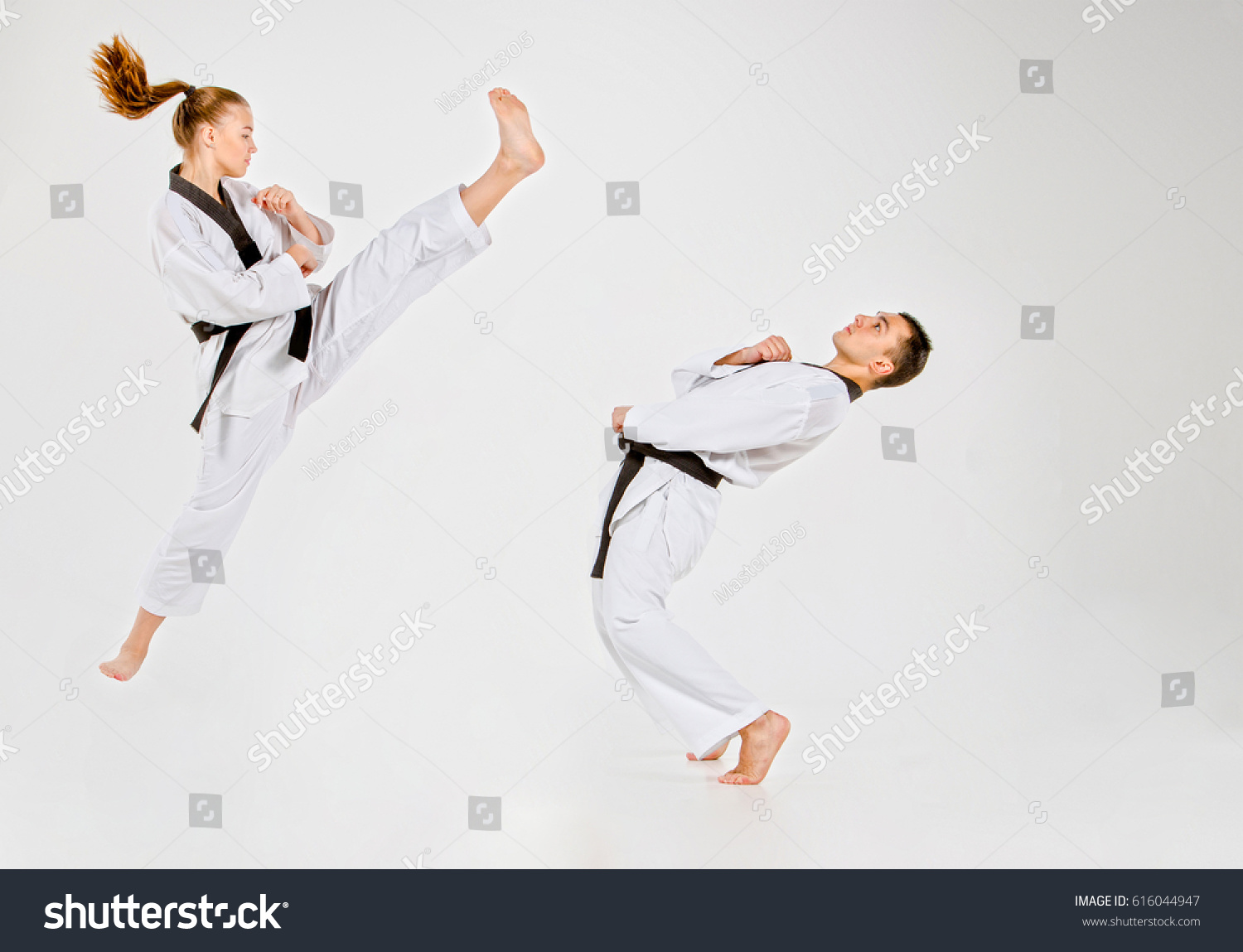 The karate girl and boy with black belts #616044947