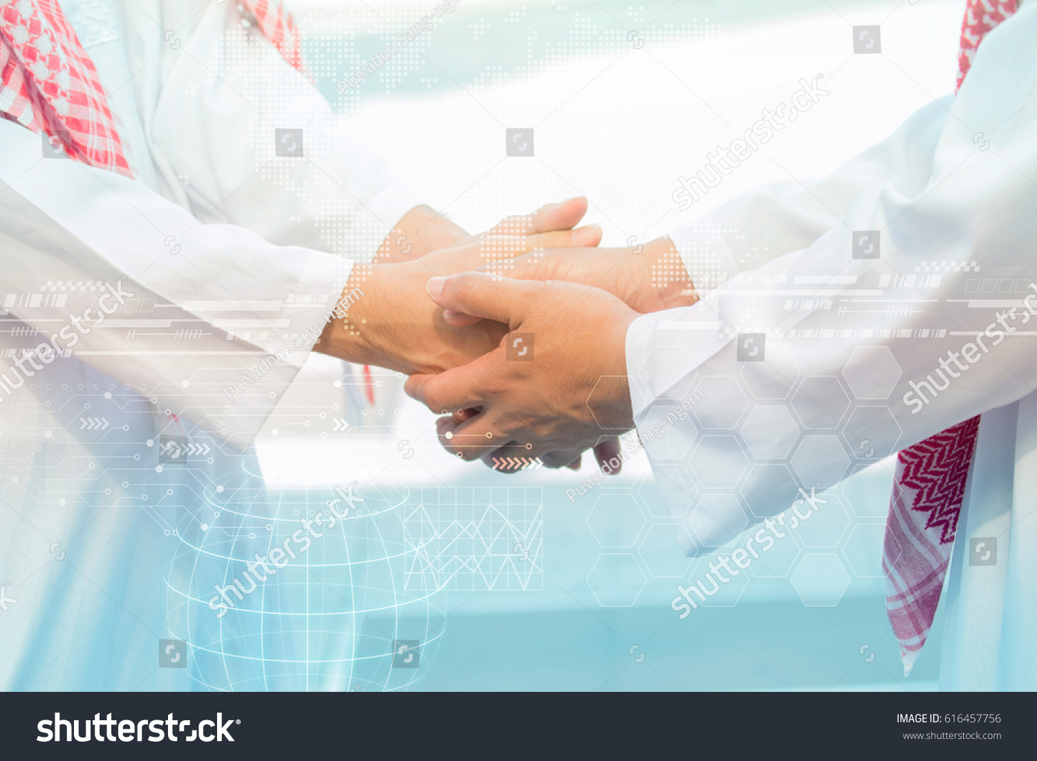 Arab Business handshake and business people on city background #616457756