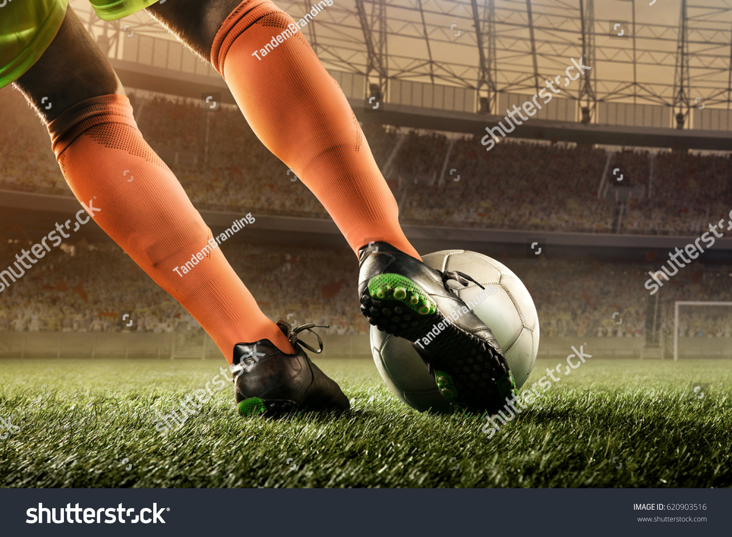 soccer player hits a ball #620903516