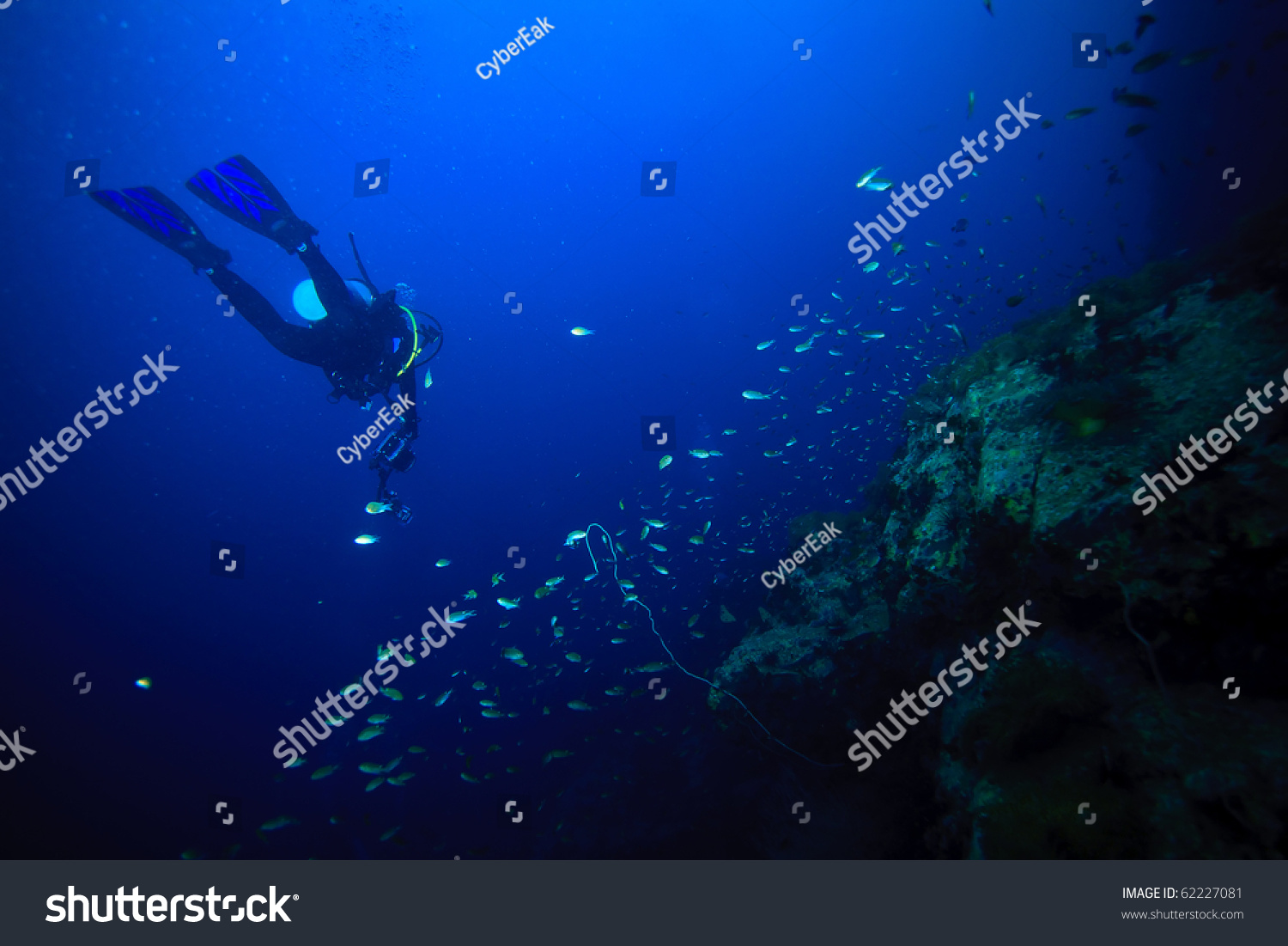 Diver swimming underwater #62227081
