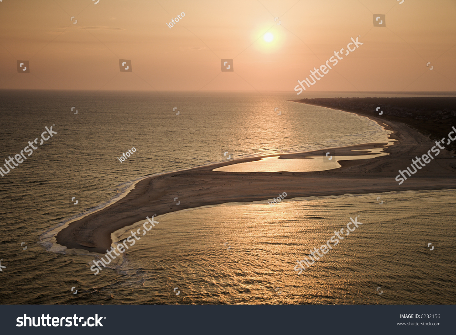 Aerial view of sun over Atlantic ocean and shoreline of Bald Head Island, North Carolina. #6232156