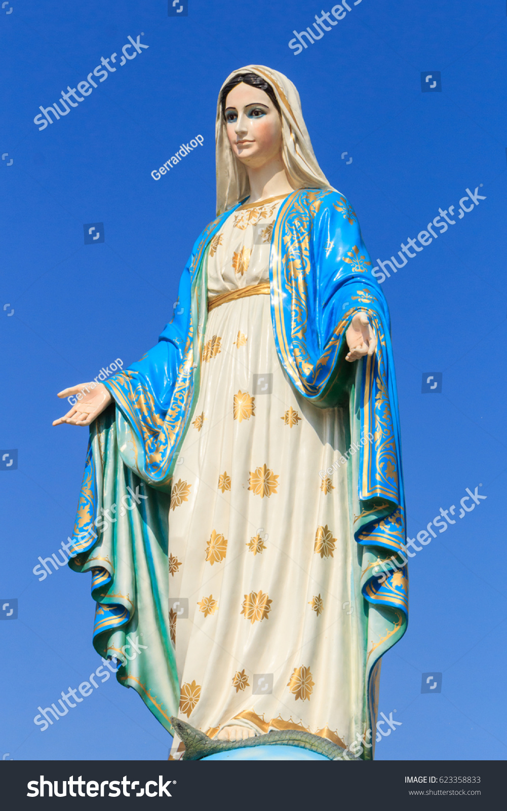 The blessed holy women Lady of Lourdes, grace virgin mother mary roman catholic statue figure. praying Church steadiliy religious pilgrimage mother of Jesus. Marian devotion Our Lady of Miracles. #623358833