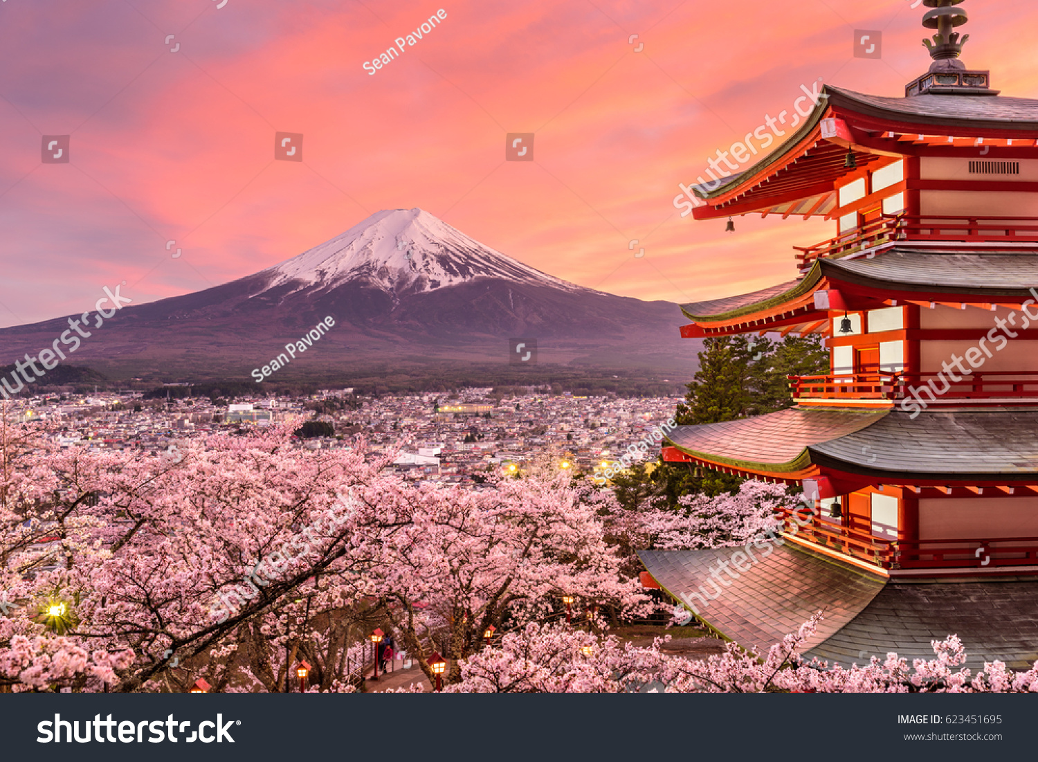 Fujiyoshida, Japan at Chureito Pagoda and Mt. Fuji in the spring with cherry blossoms. #623451695