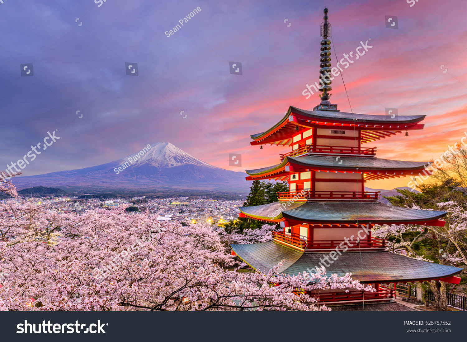 Fujiyoshida, Japan at Chureito Pagoda and Mt. Fuji in the spring with cherry blossoms. #625757552