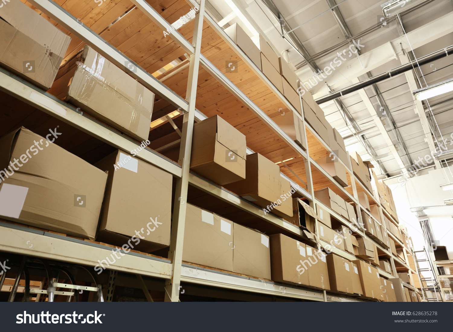 Boxes with goods in wholesale warehouse #628635278