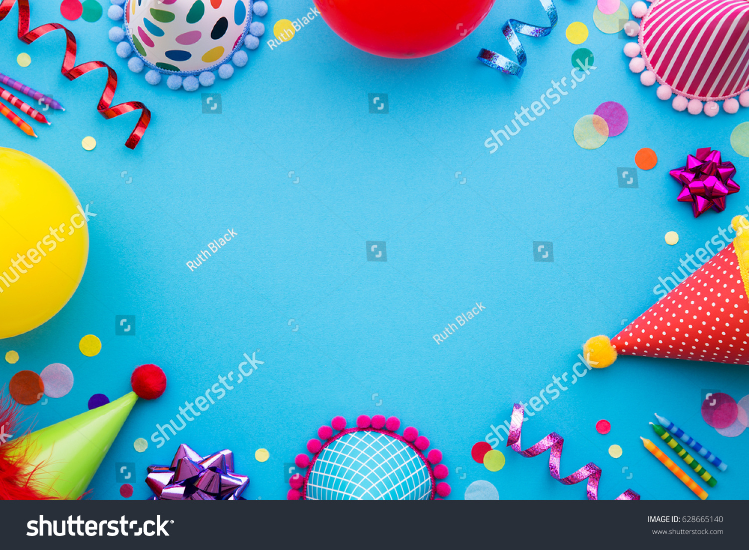 Birthday party background with party hats and streamers #628665140