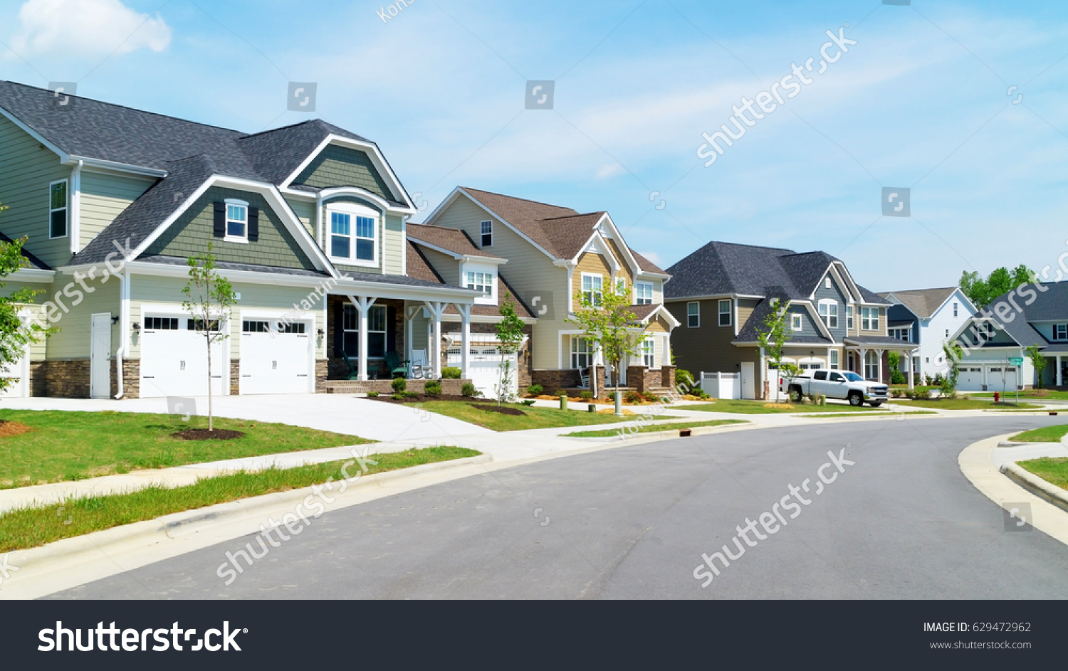 Street of suburban homes #629472962