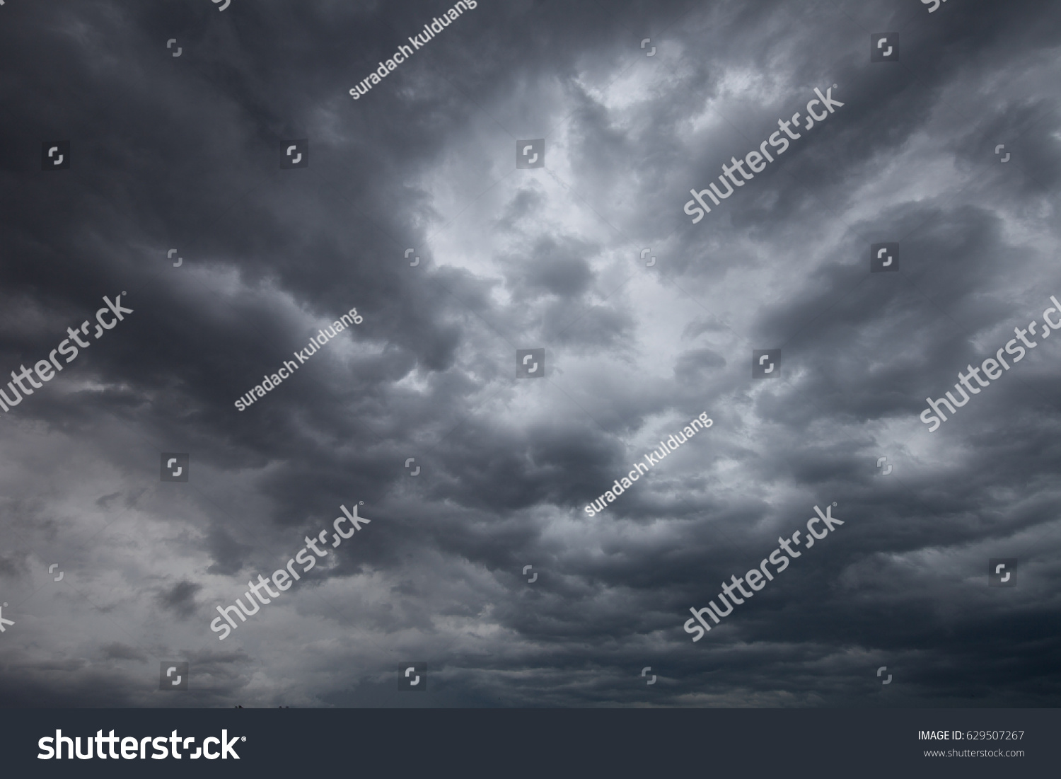 Dark clouds promise rain. #629507267