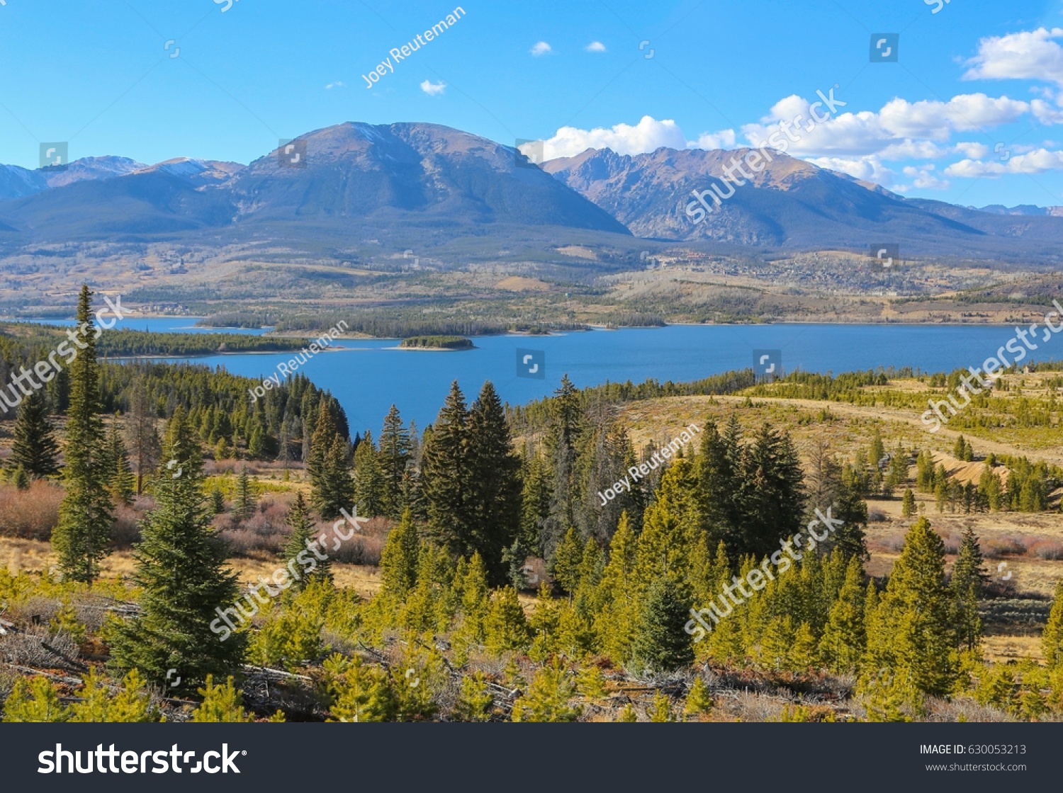 Looking out towards Lake Dillon and the Gore Range beyond from Swan Mountain in Summit County, Colorado on a clear summer day. #630053213