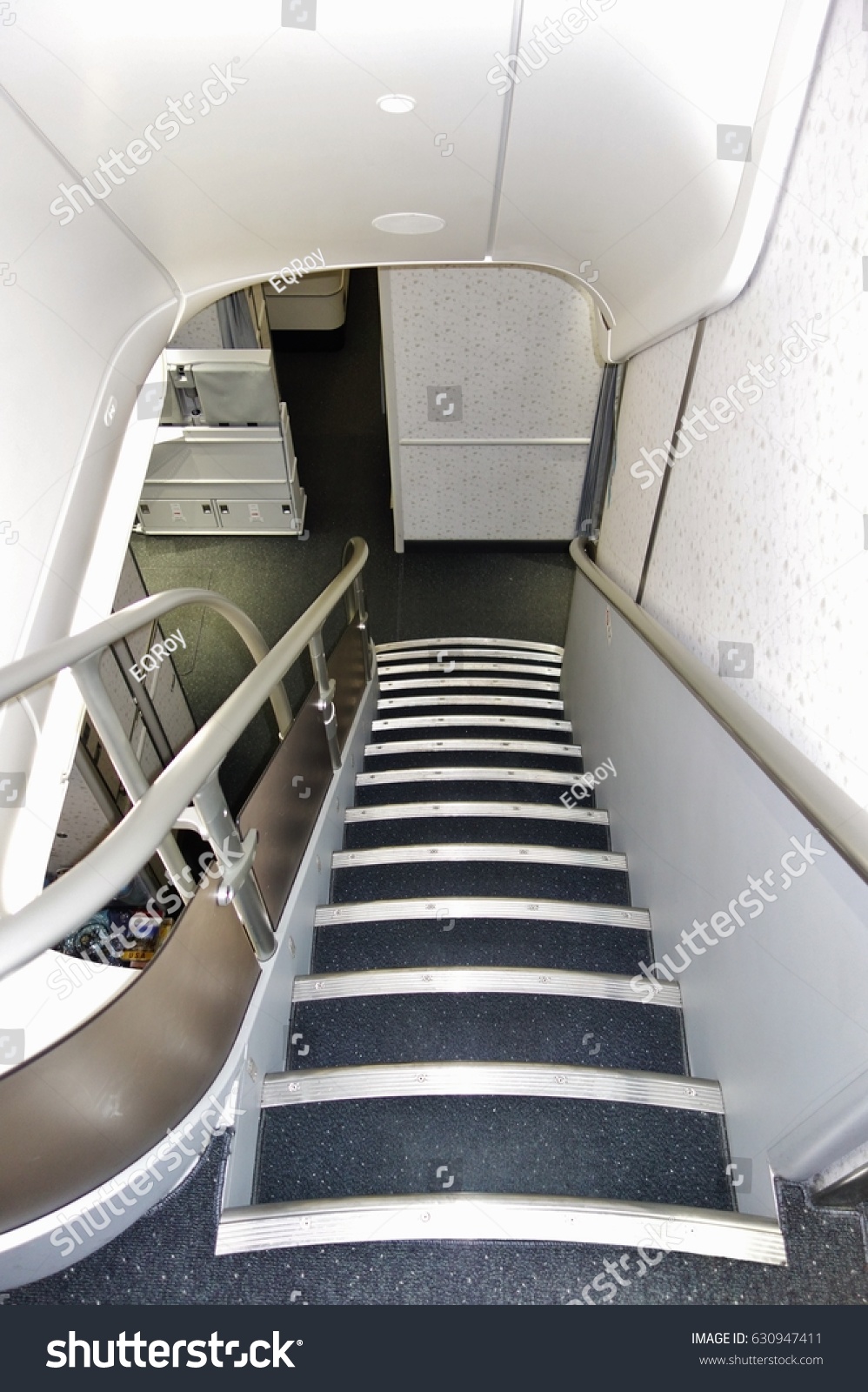 SEOUL, SOUTH KOREA -25 MAR 2017- View of the internal staircase inside a Boeing 747-8 airplane from Korean Airlines (KE). #630947411