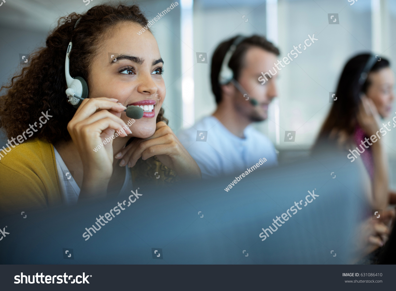 Customer service executive working at office #631086410