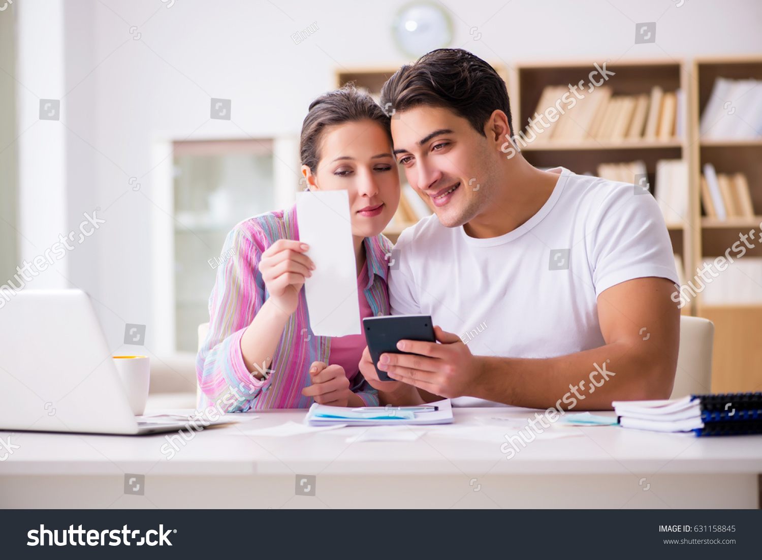 Young family discussing family finances #631158845