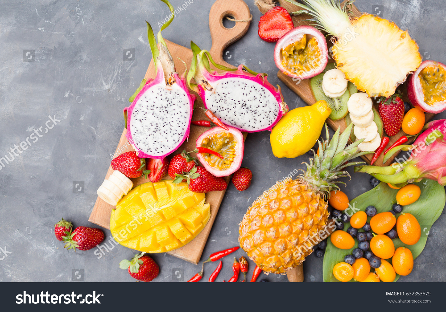 Exotic fruits on a gray background. 