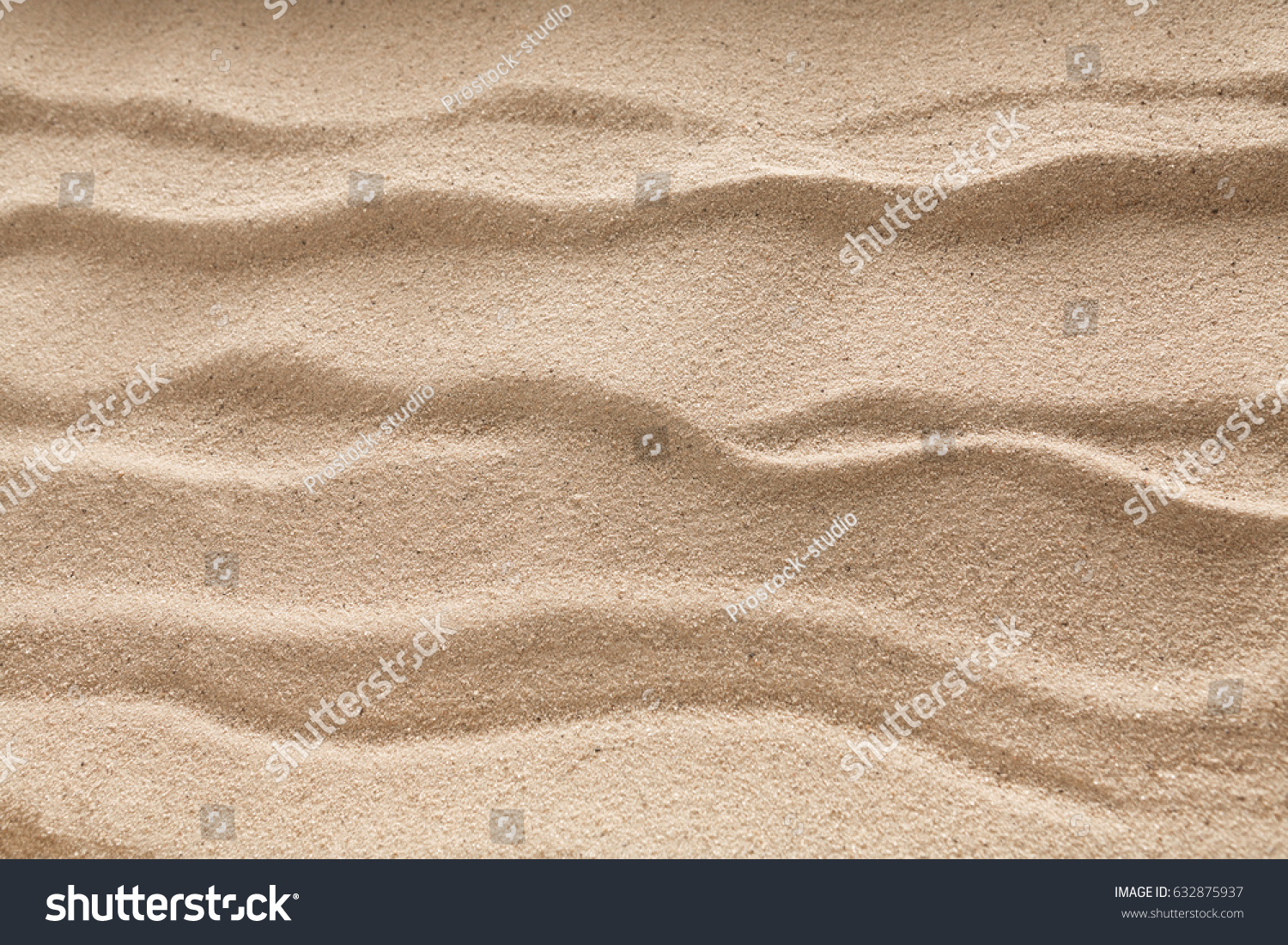Beach wavy sand background. Natural seashore texture surface, closeup #632875937