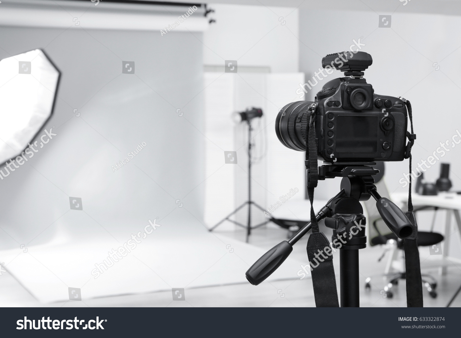 Modern photo studio with professional equipment #633322874