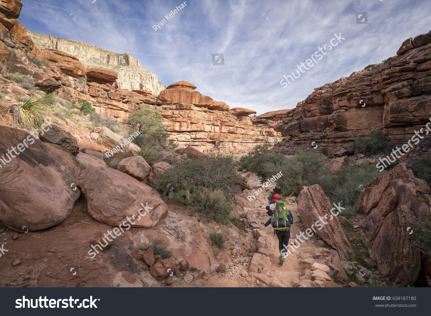 Group of Hikers backpacking through the Grand Canyon to Havasu Falls, Arizona #634187180