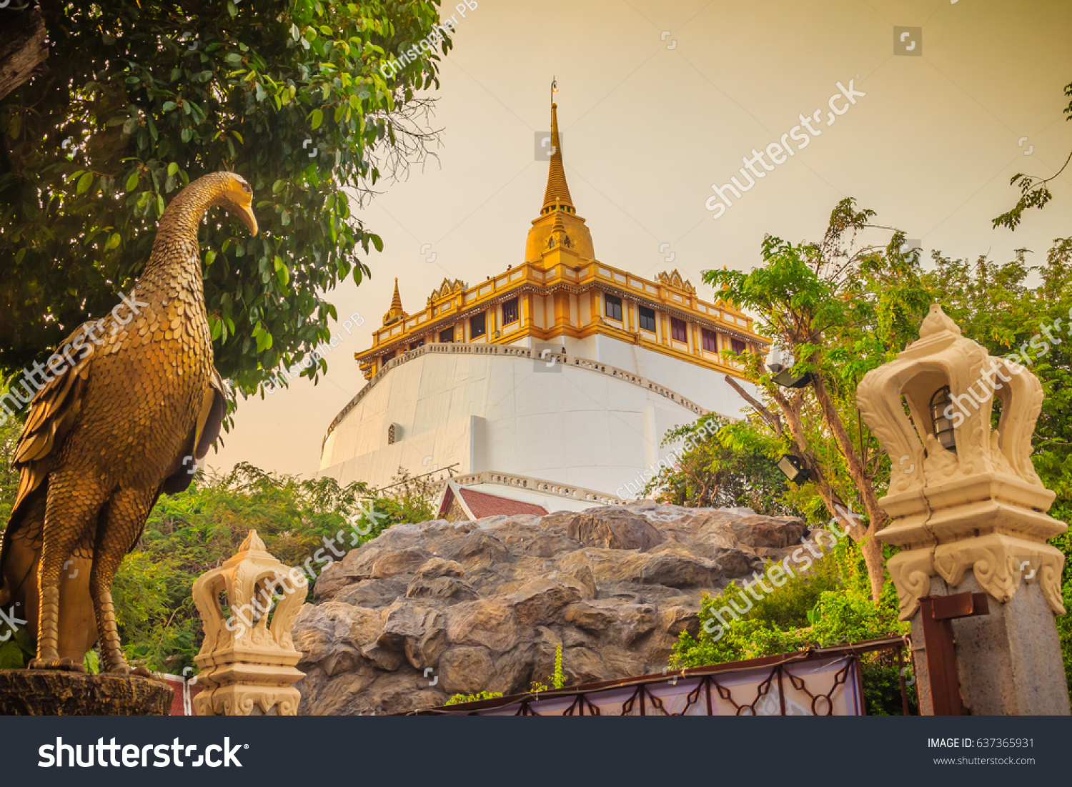 Beautiful peacock sculpture at front of Wat Saket Ratcha Wora Maha Wihan (Wat Phu Khao Thong, Golden Mount temple), a popular Bangkok tourist attraction and has become one of the symbols of the city. #637365931