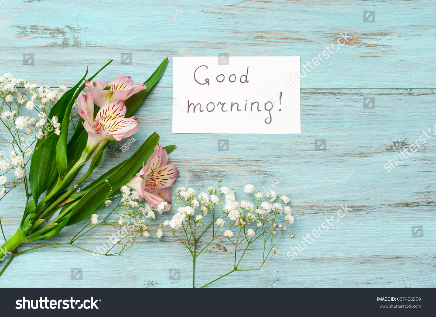 
Flowers and the inscription "Good Morning" on a wooden, turquoise background. The concept of happiness and joy. #637406599