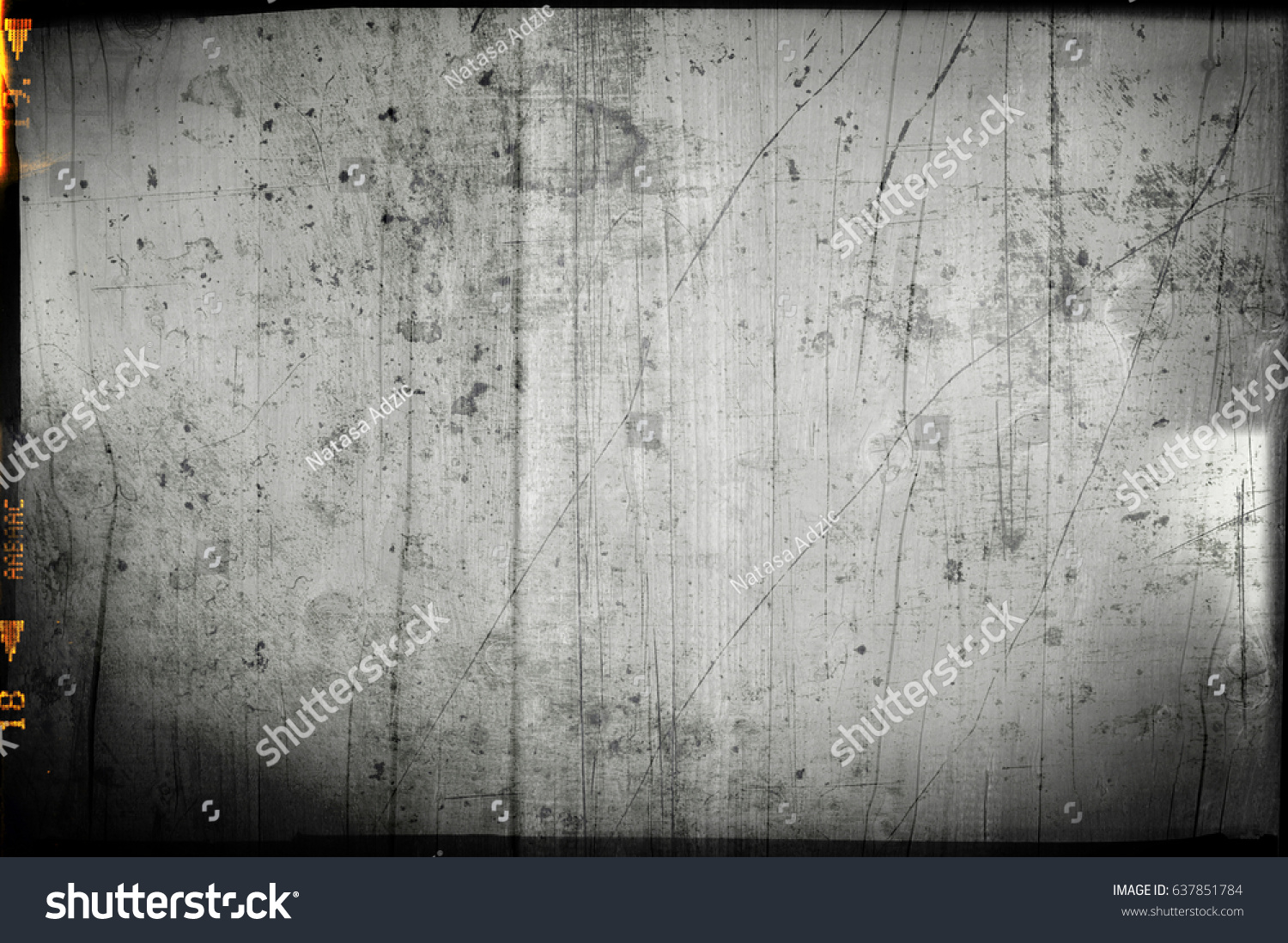 Blank grained and scratched film strip texture background #637851784