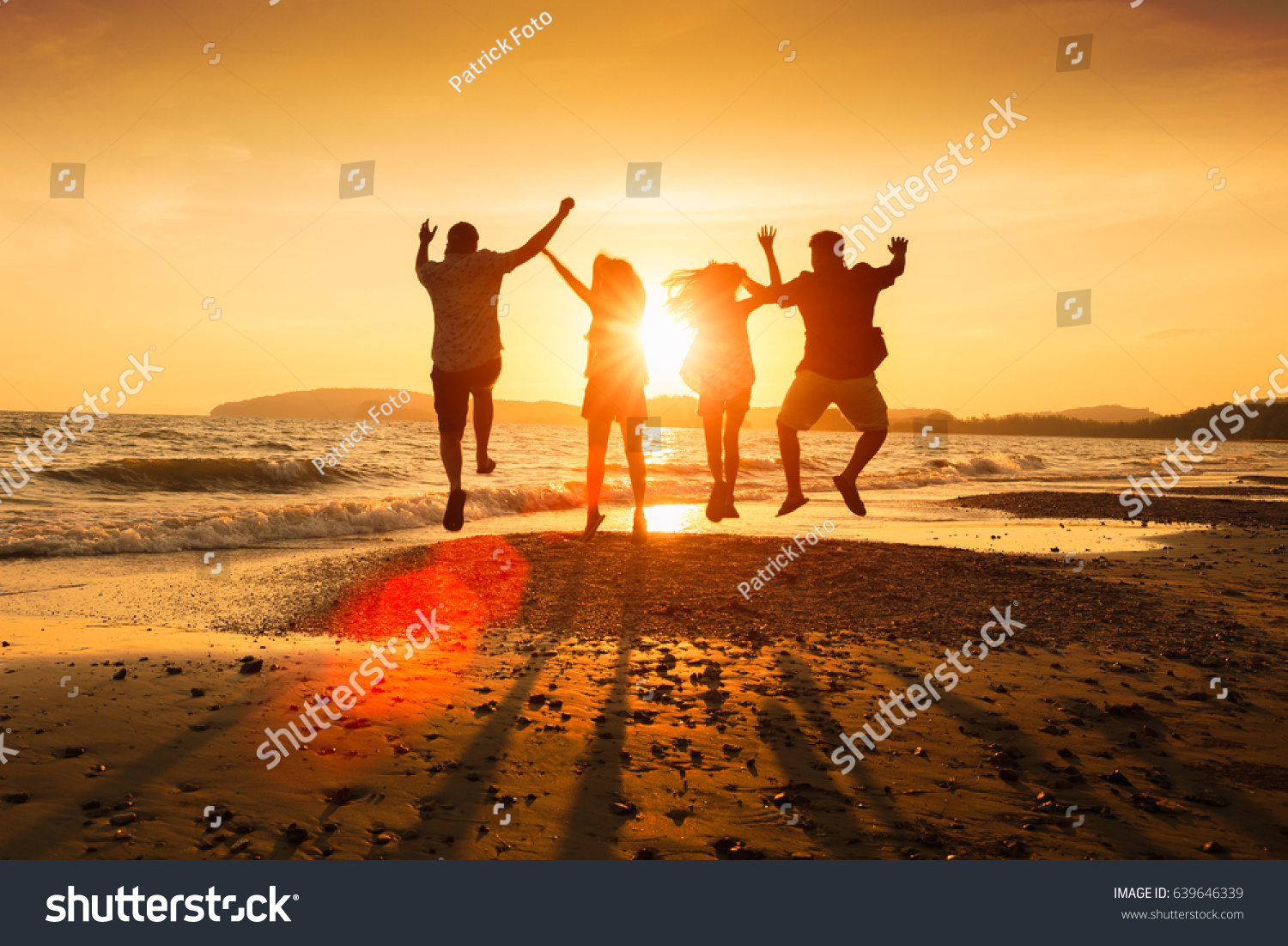 Asian family running on background of sunset beach and sea #639646339