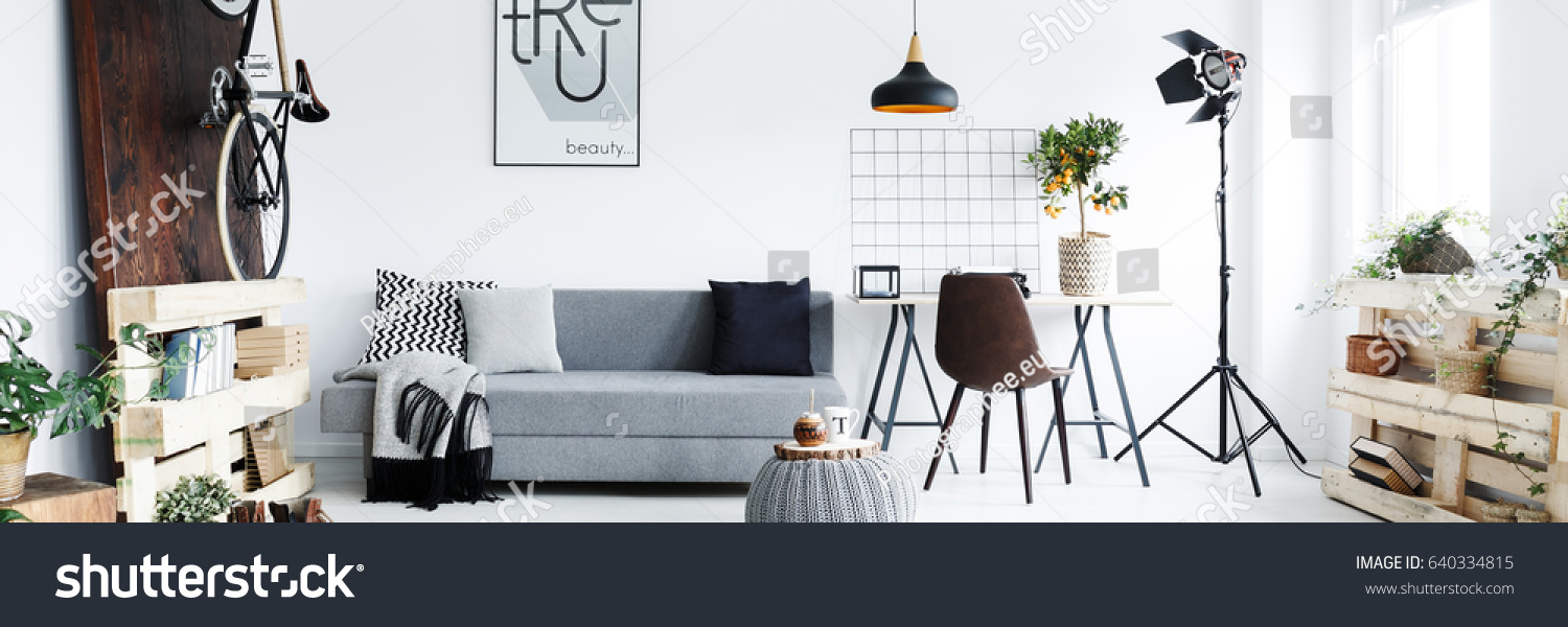 Panorama of minimalist apartment for man with hipster furniture #640334815