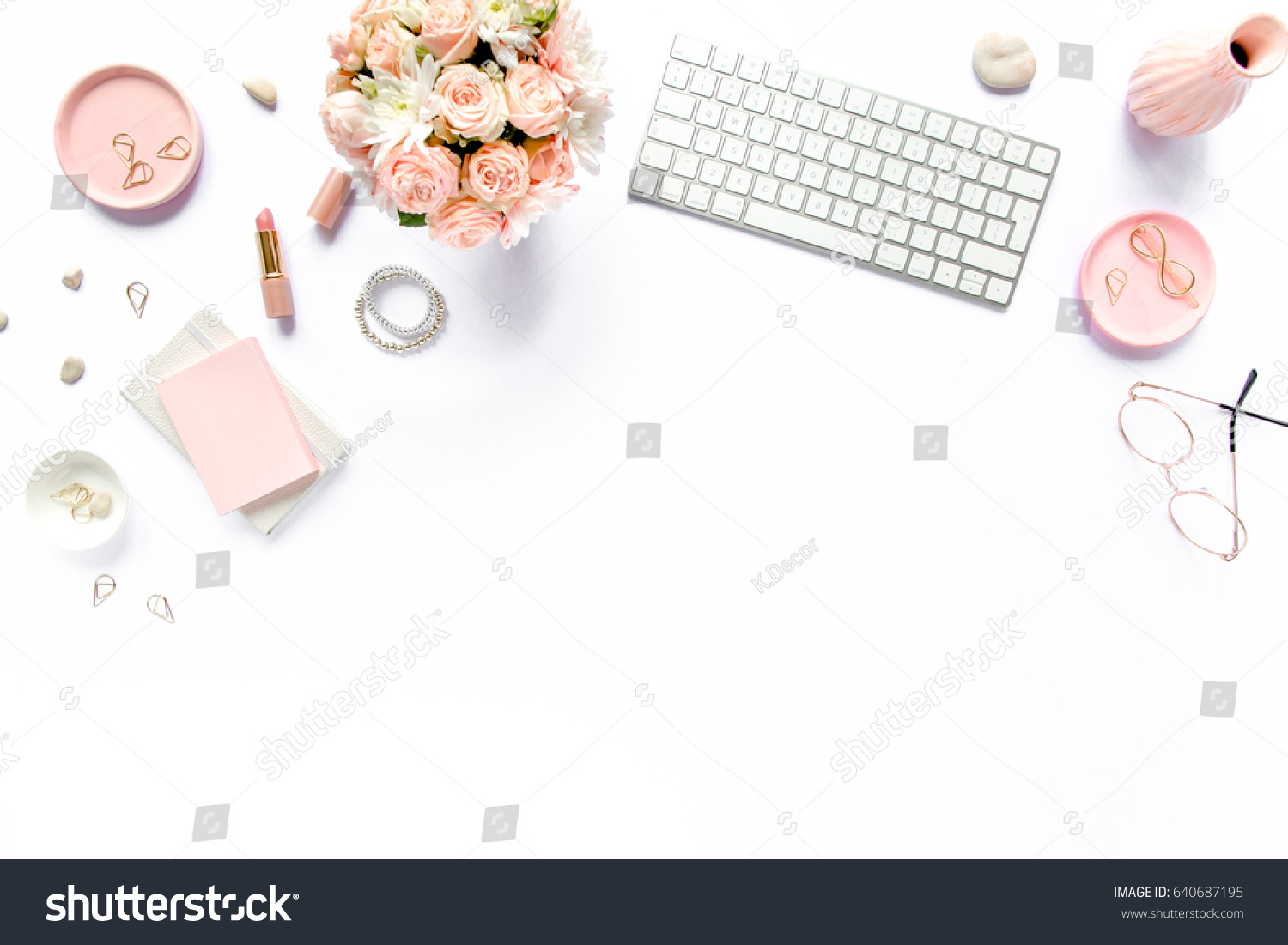 Stylized women's desk, office desk. Workspace with, laptop, bouquet roses, clipboard. Women's fashion accessories isolated on white background. Flat lay Top view #640687195