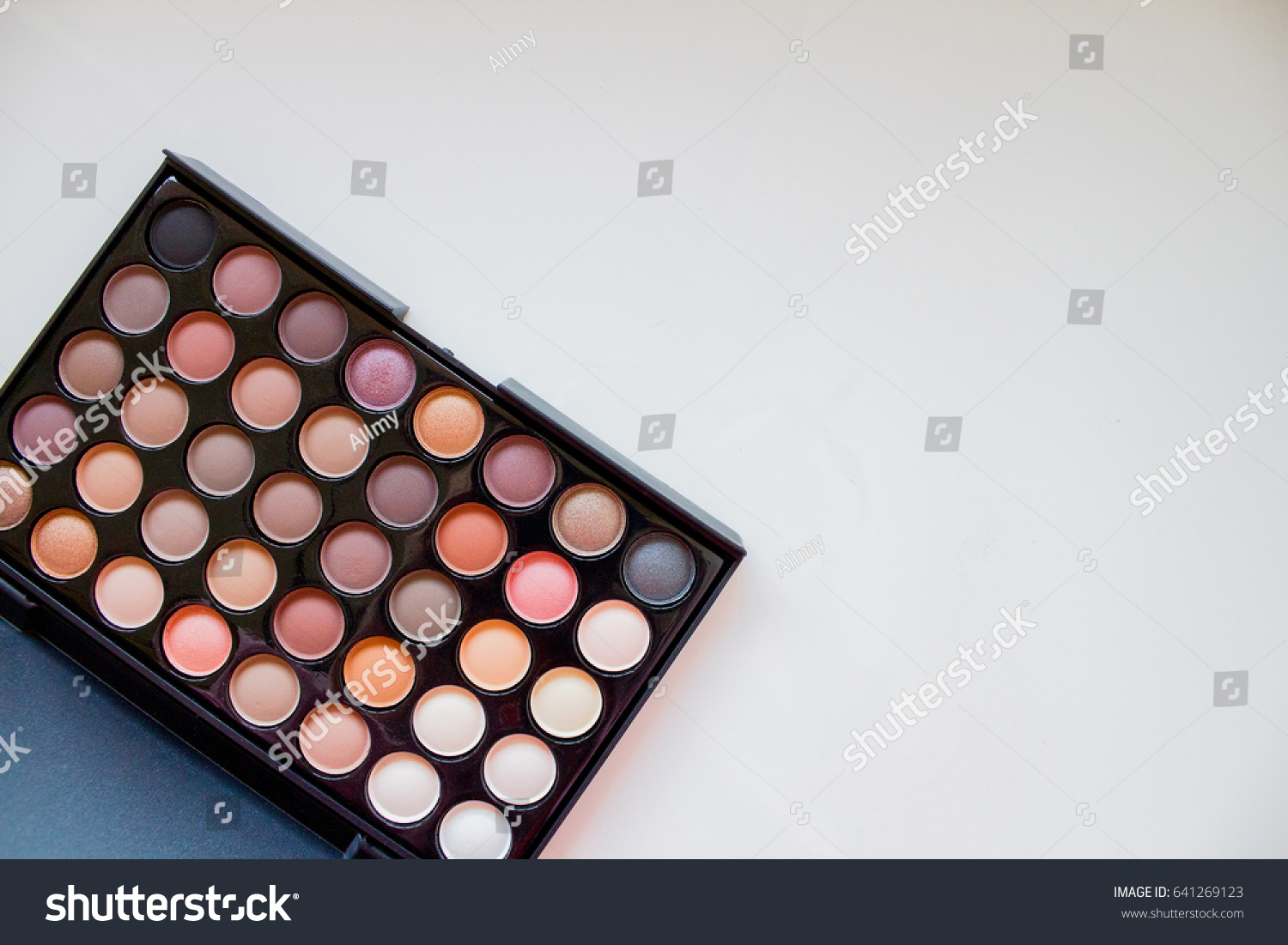 Female palette for eye shadows with different colors
 #641269123