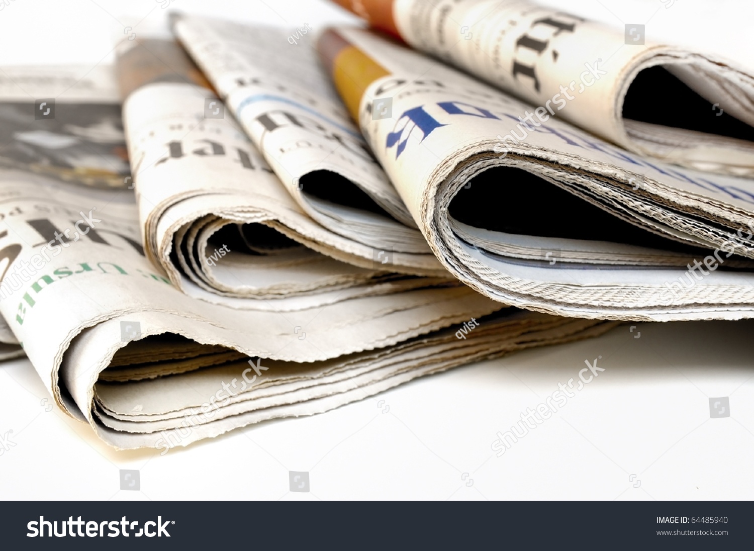 Various newspapers over white background #64485940